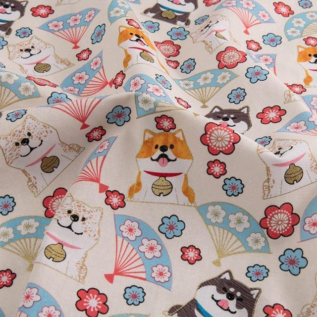 A brown shiba on white fabric