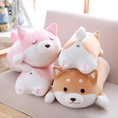 four happy shiba plush japan stacked on top of each other