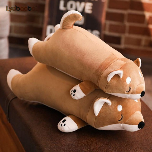 one sleep chilled shiba on top of another