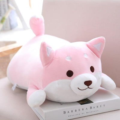 cute shiba inu plush that is pink with eyes wide and a grin happy shiba plush