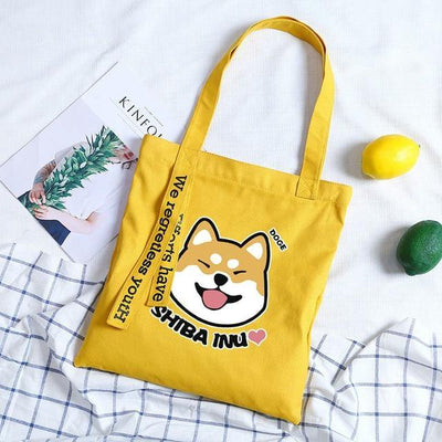 Smiling shiba on a yellow bag