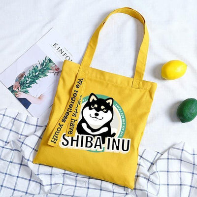 Yellow tote bag with a black shiba inu design