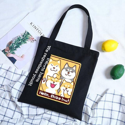 4 shiba inus on a black tote bag