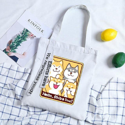 Sky blue tote bag with four shibas