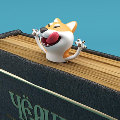 Shiba Inu character with tongue out in a book