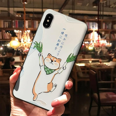 Shiba Inu with grass holding and leg lifting on a phone case