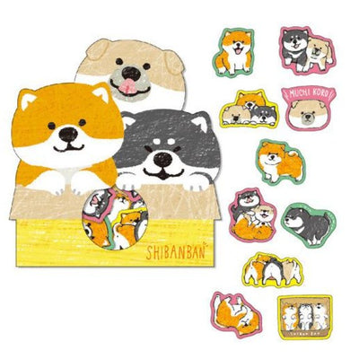 a set of shibas in orange grey and black