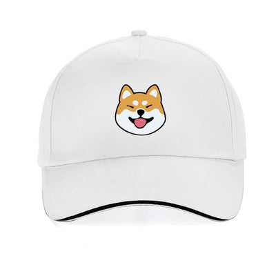 Smiling shiba on a white cap