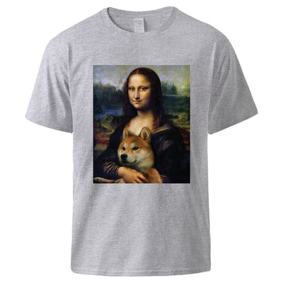 Gray top with the monalisa and she is holding a shiba inu dog