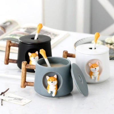 Three cups with a shiba inu on them in gray, black and white