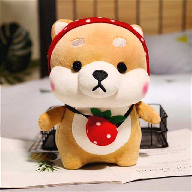 Shiba plushie with a strawberry