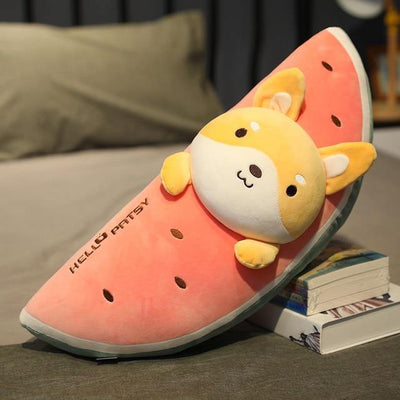 A shiba dog with pointy ears in a melon plush