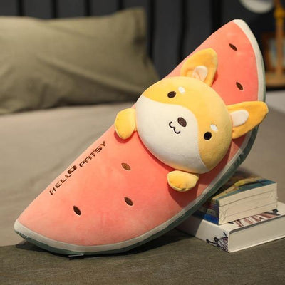 A shiba dog with pointy ears in a melon plush
