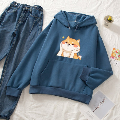 dark blue hoodie next to some jeans