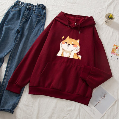 Red shiba hoodie by a postcard