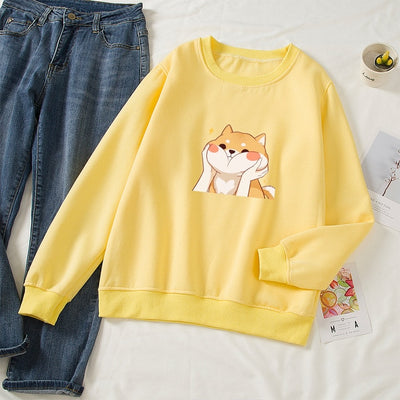 yellow sweatshirt with a squeezy faced shiba