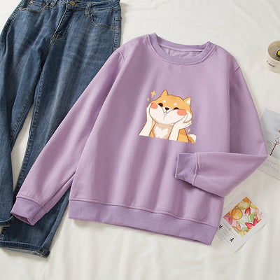 shiba inu design printed on a purple sweatshirt
