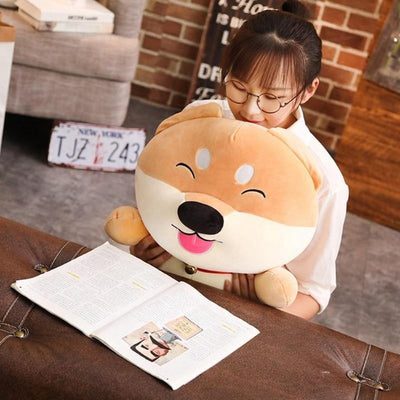 Woman sitting with a shiba dog cartoon plush toy