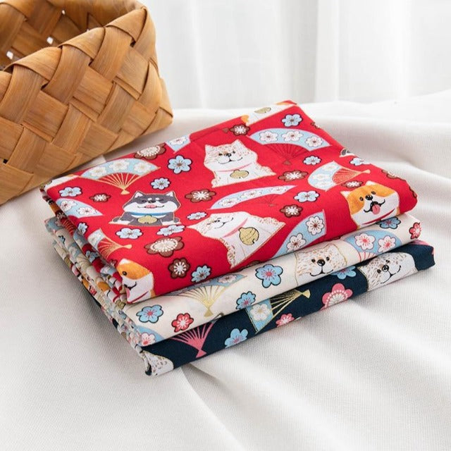 3 types of fabric stacked on top of each other with shiba patterns
