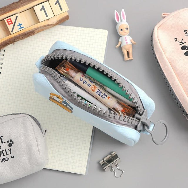 open bag of pens on table with paper fastener