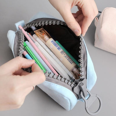 Opened pencil case with pens and pencils